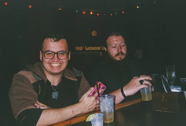 Two guests share drinks at the Easy Tiger bar.